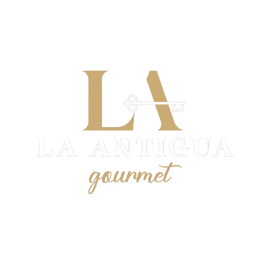 Logo of La Antigua Gourmet with a large golden LA and a key design on a teal background.