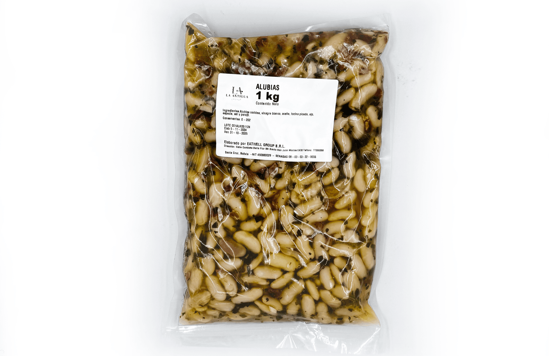 Vacuum-sealed package of cooked white beans with seasoning, labeled as 1 kg.